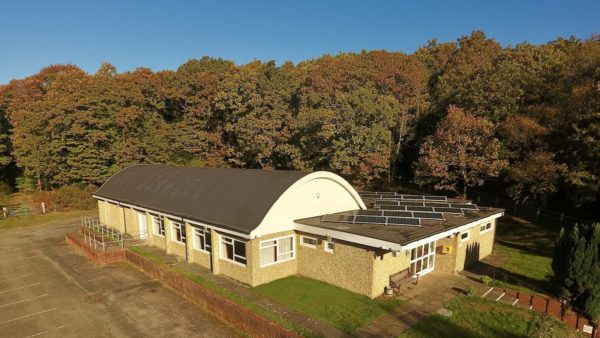 Village Hall from the air with some solar panels.